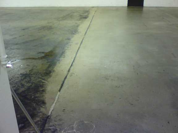 Cleaning A Factory Warehouse Concrete Floor